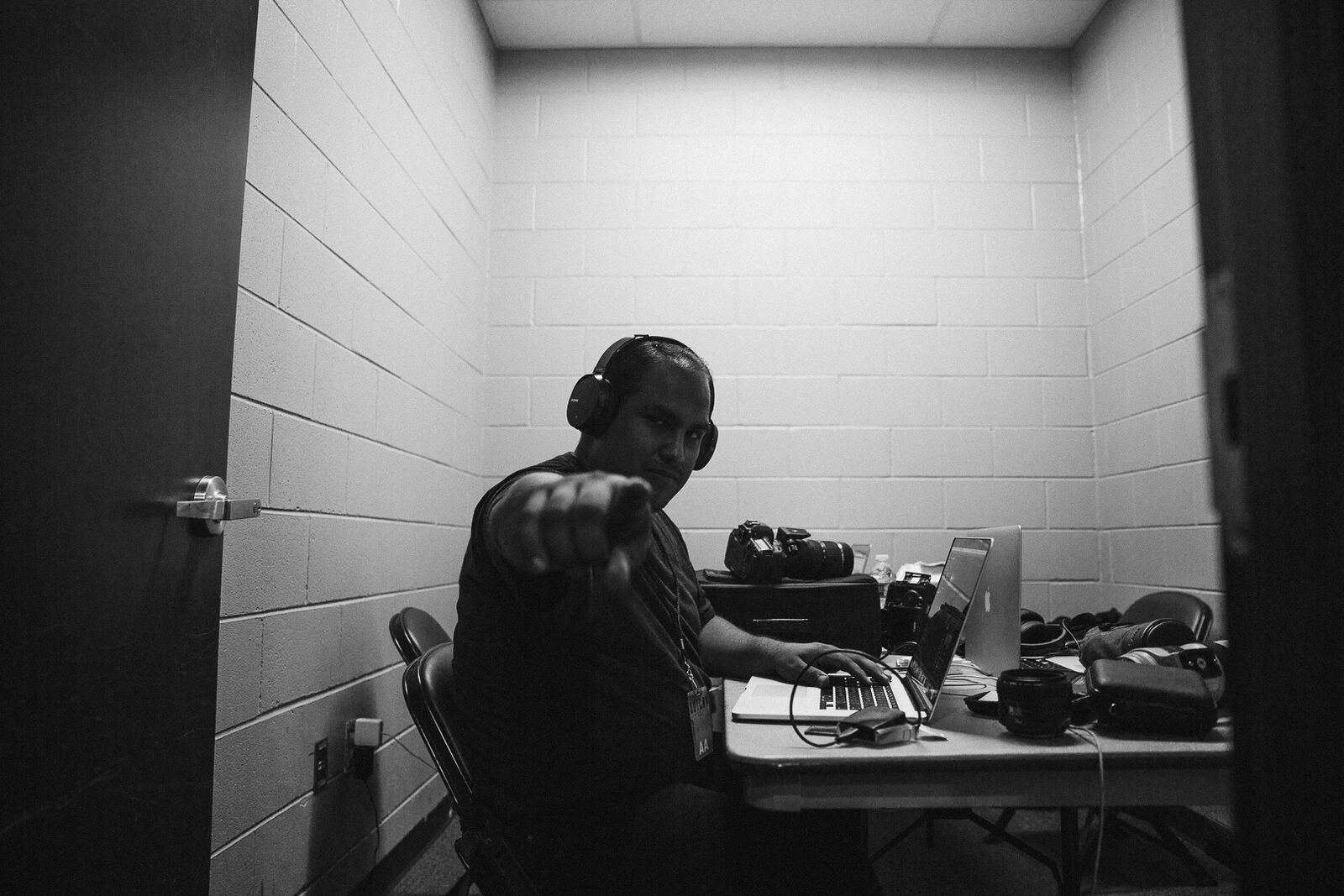 Black-and-white audio desk behind the scenes