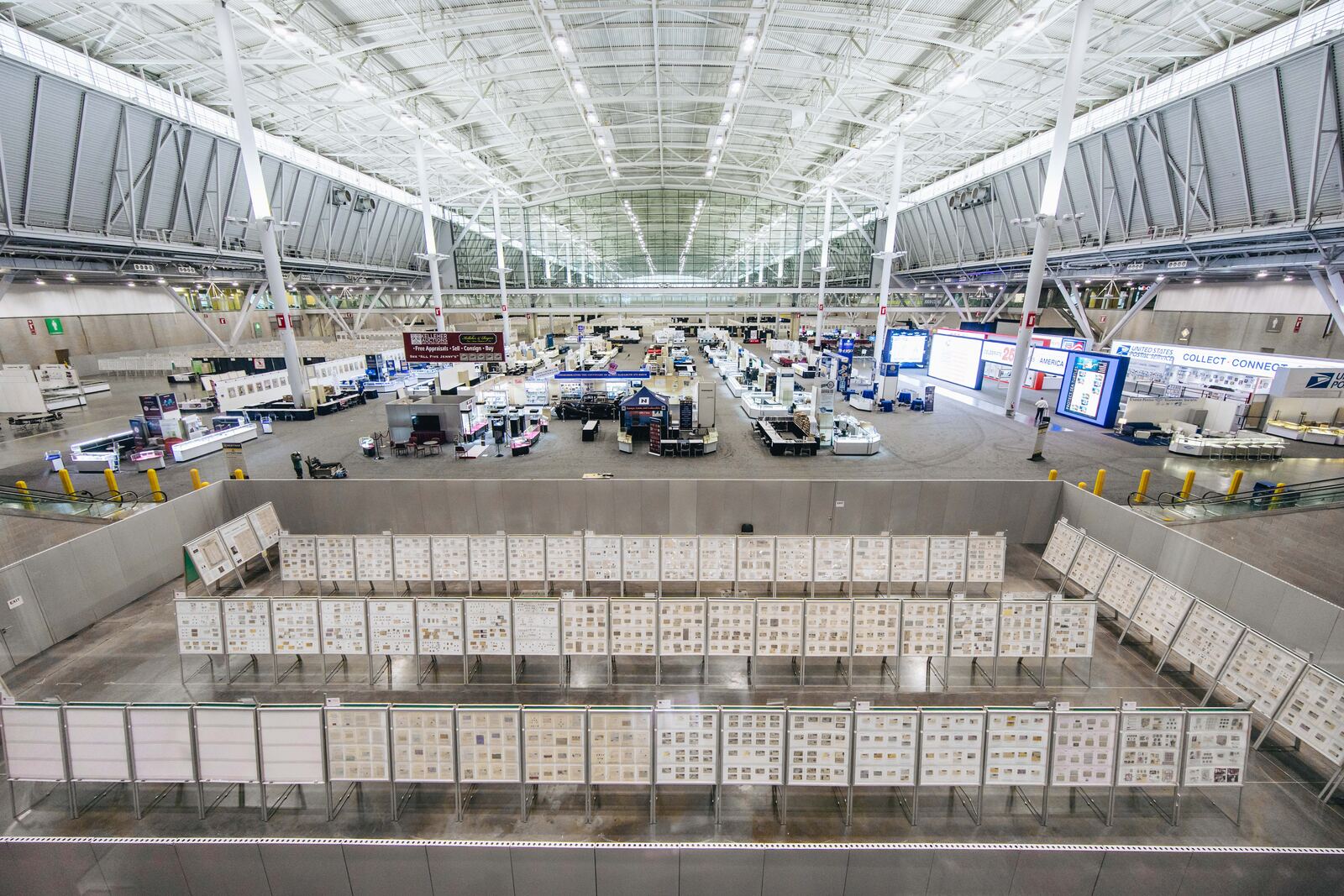 Overhead view of a show floor mid-install